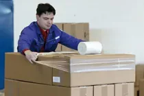 Omotavanje kutija elastičnom trakom Sanstrap®
